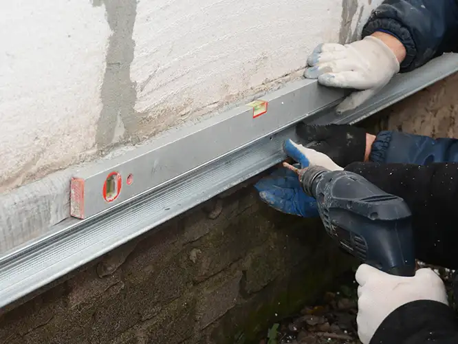 photo of workers repairing a home's foundation
